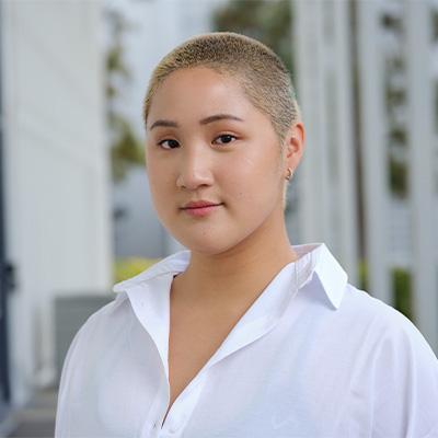 a woman posing for headshot